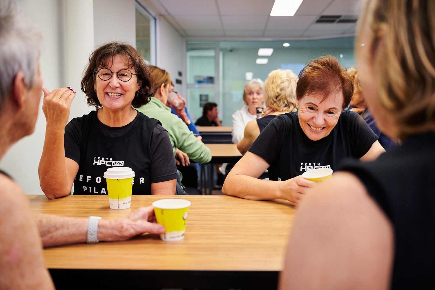 Group of ladies enjoying a coffee and chat at on-site cafe after Reformer Pilates class at Perth HPC