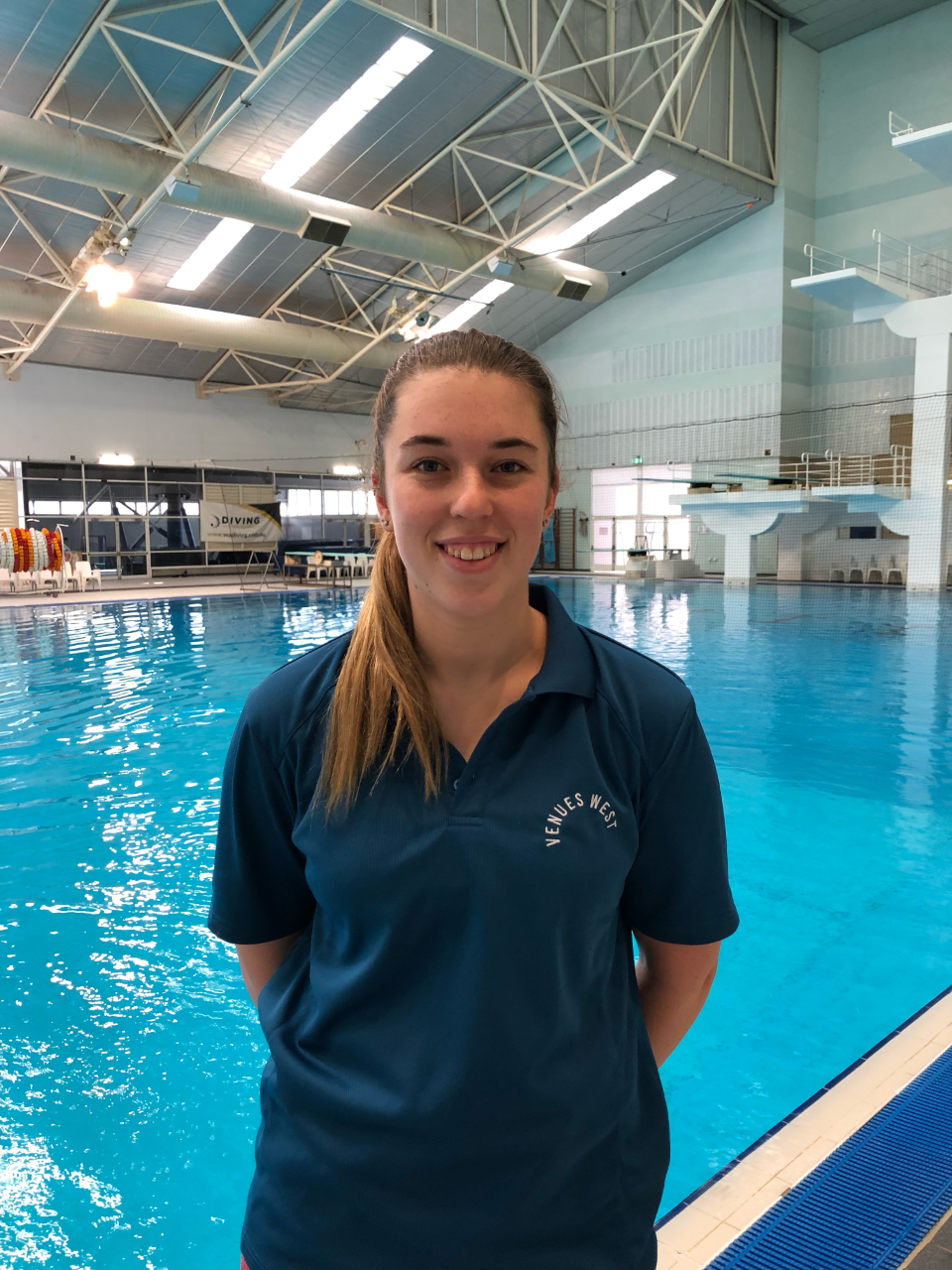 lady in front of pool