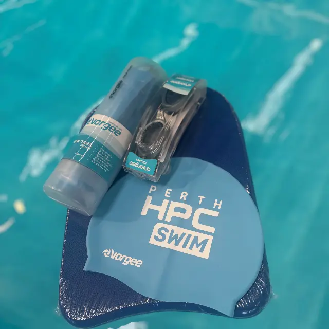 Prize pack example with goggles, kickboard, towel and swim cap for swim to win competition