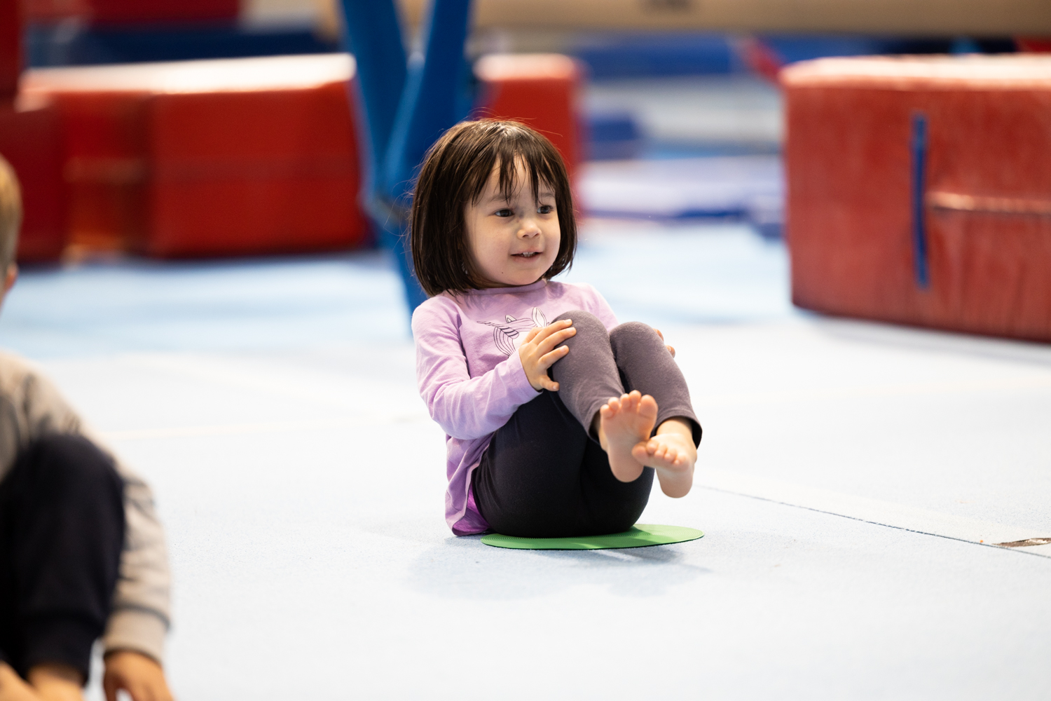 Photo, child doing activity on floor mats at the Gymnastics Training Centre, Perth HPC